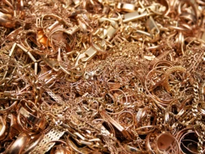 a pile of old gold jewelry prepared for precious metal refining