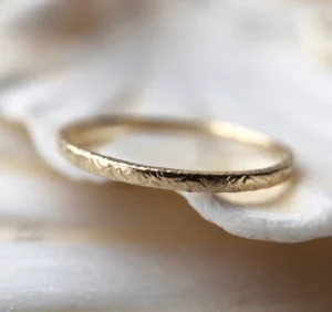 a thin gold ring offered by etsy