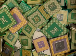 An assorted pile of CPUs removed from computers for precious metals recycling.