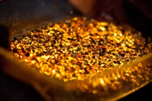 closeup picture of many ingots of melted gold